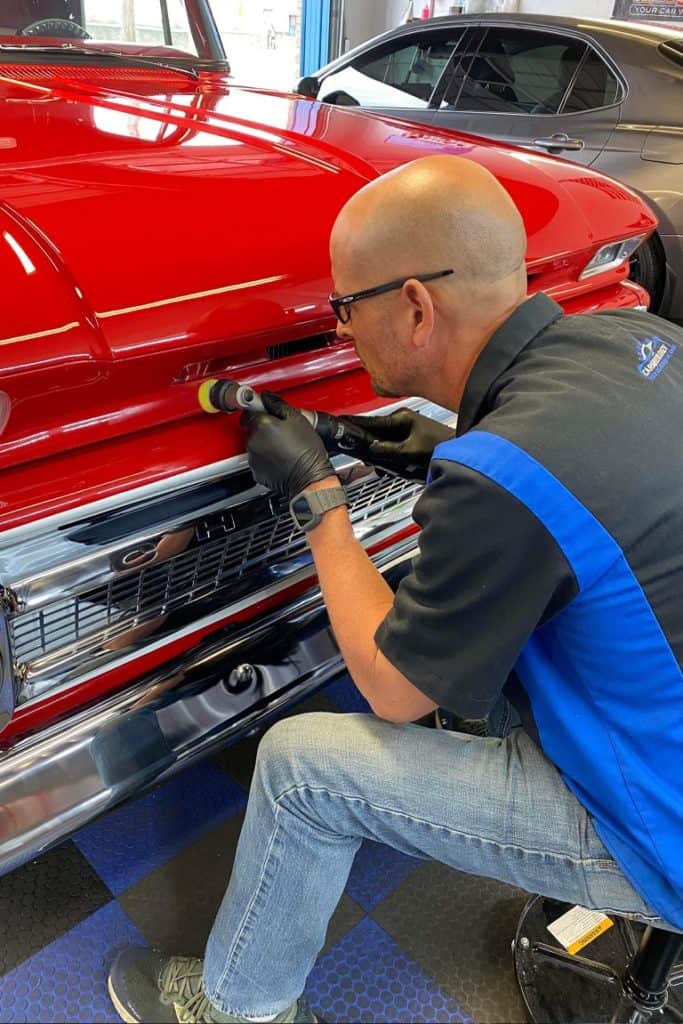 nathan of dr details carsmetology polishing an exterior on a vintage car (medium)